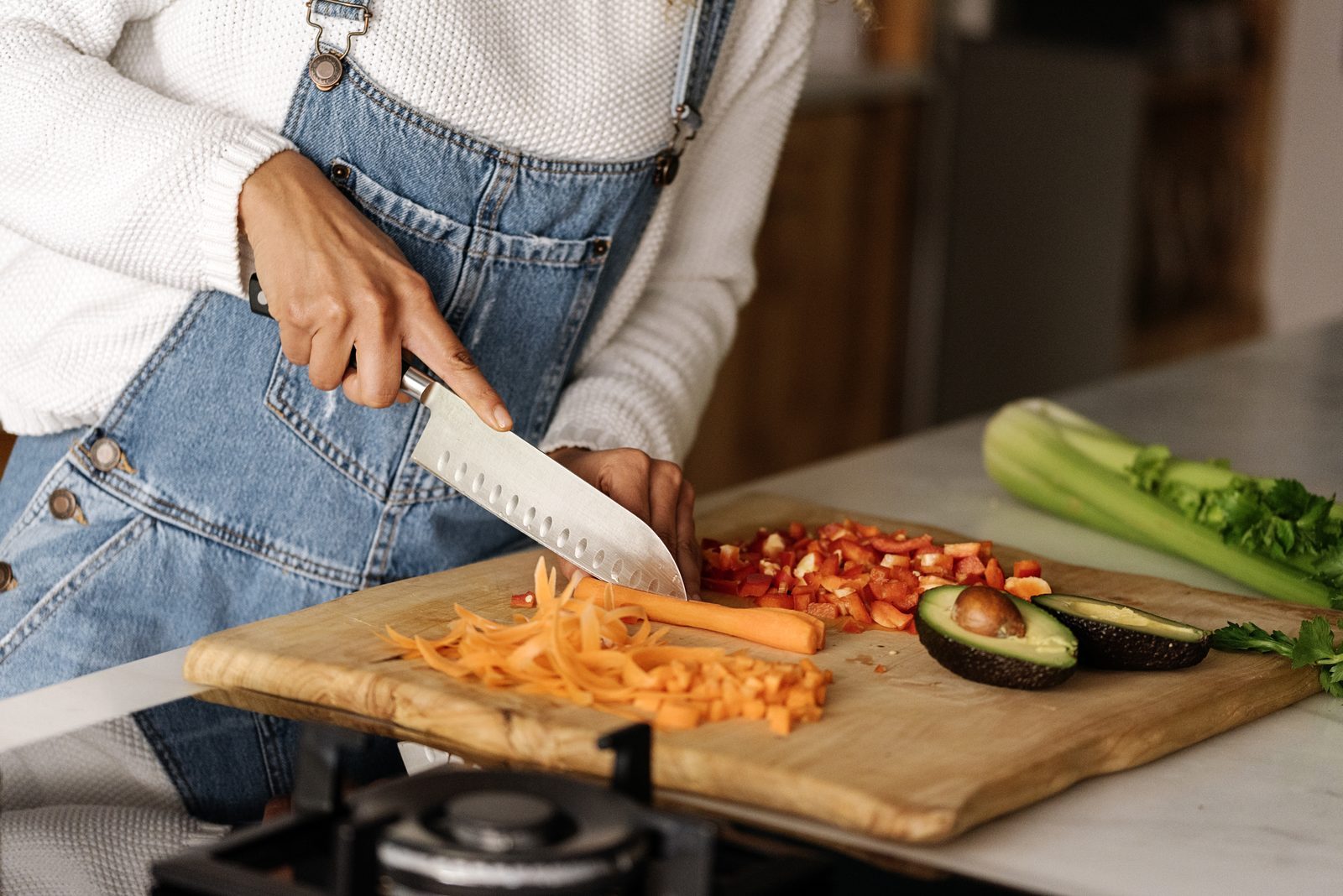 Chopping vegetables on a wooden board